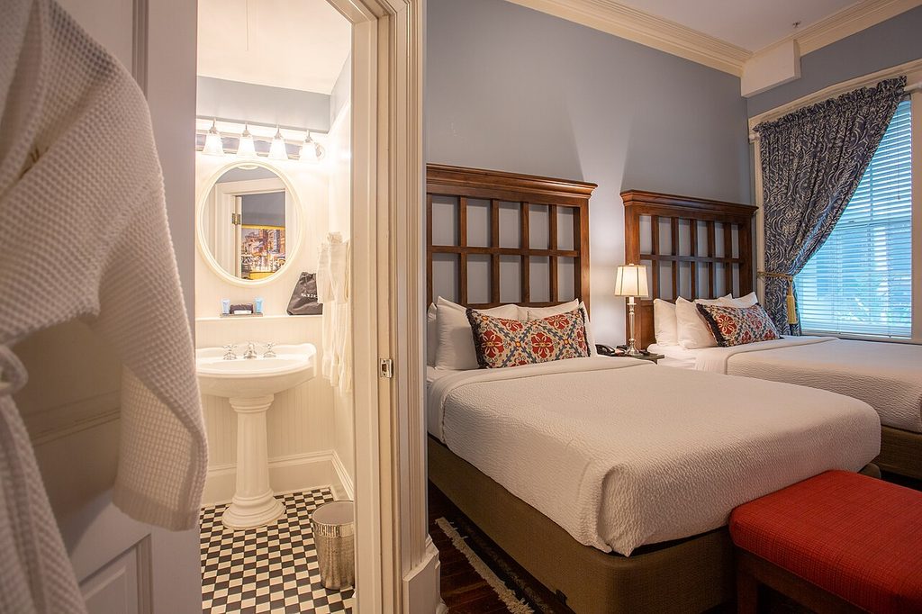 Historic guest room inside The Marshall House in Savannah Georgia