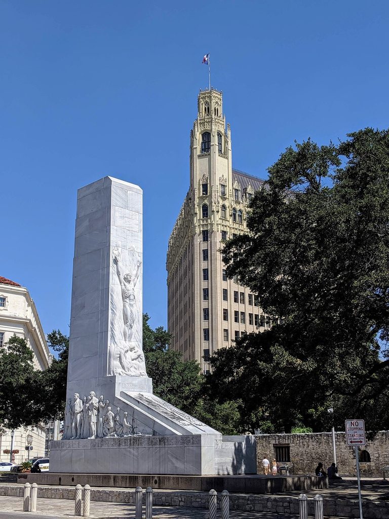 Alamo Cenotaph with the Emily Morgan Hotel in San Antonio Texas